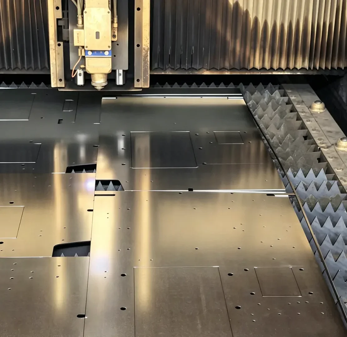 CNC laser cutting machine processing flat sheet metal panels